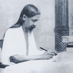 Picture of Sri Aurobindo writing